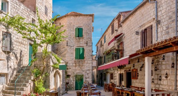 Traditional stone street with a restaurant in Stari Grad, Hvar