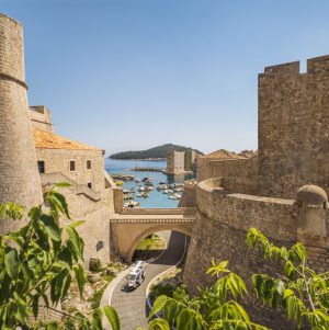 View from Dubrovnik’s city walls toward the old port and Lokrum island