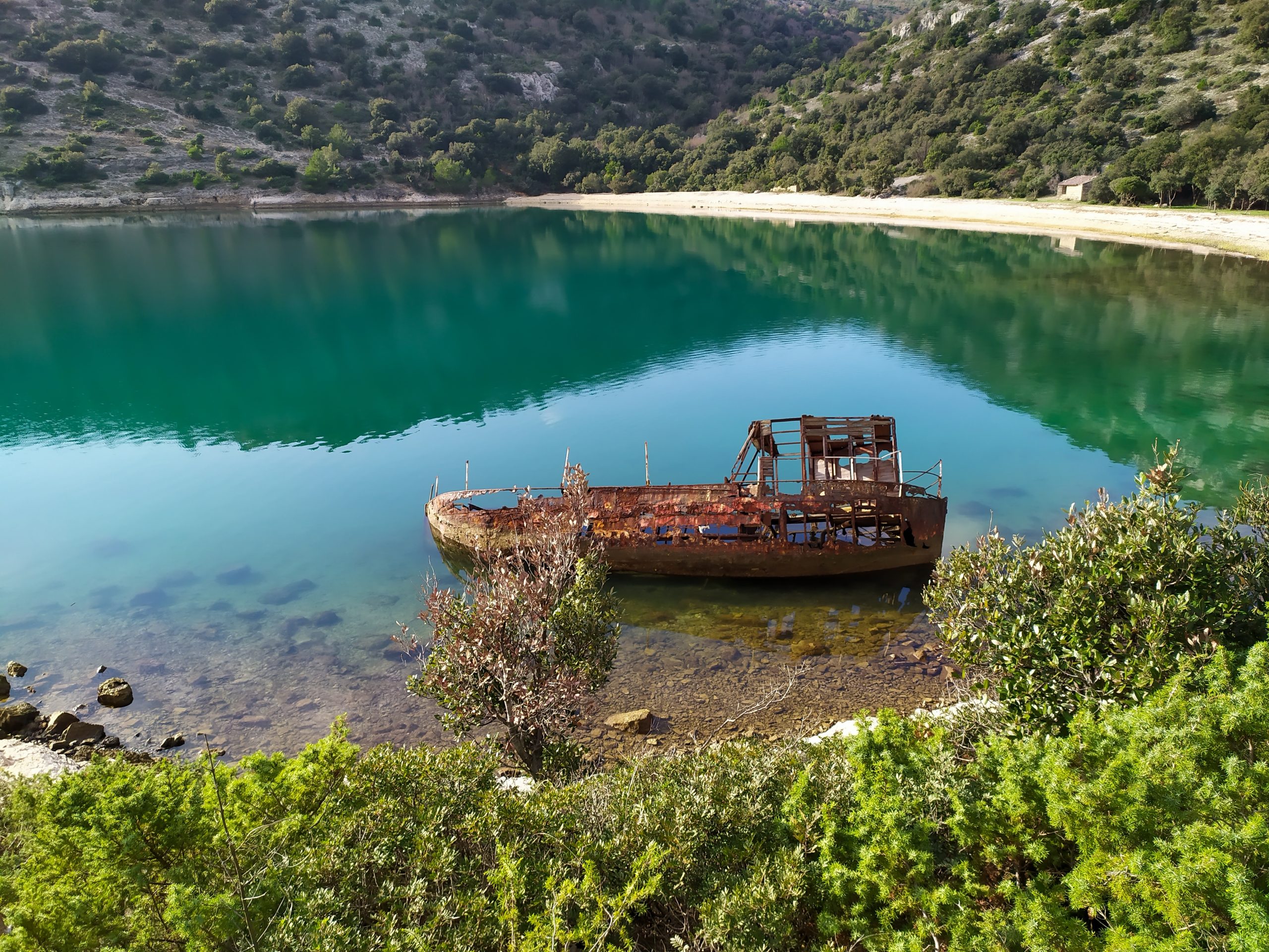 The wreck of an old ship rising from the water. The wreck of an old ship rising from the water.
