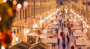 Dubrovnik Old Town illuminated during Advent with Christmas lights and festive stalls