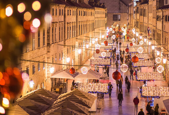 Dubrovnik Old Town illuminated during Advent with Christmas lights and festive stalls