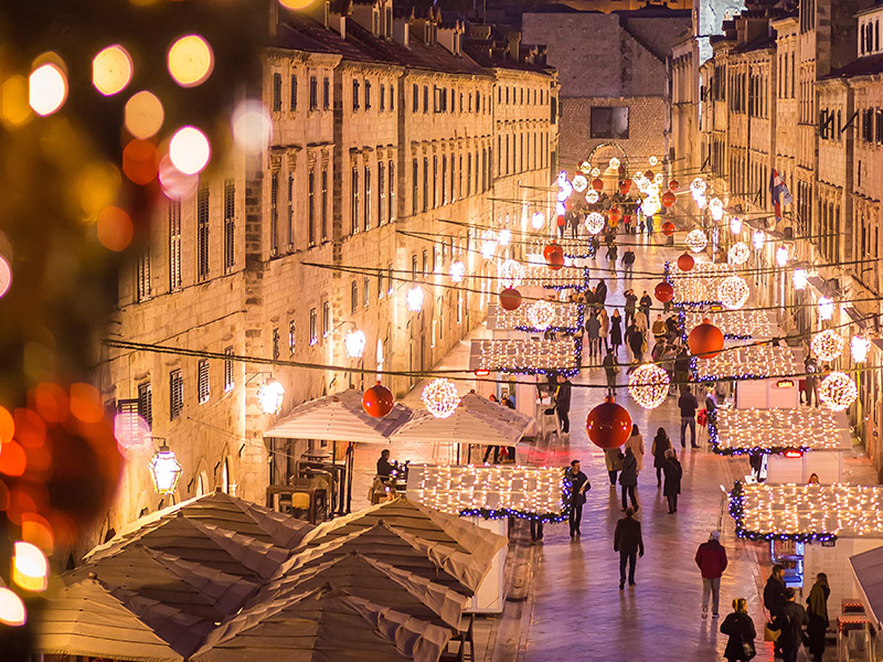 Dubrovnik Old Town illuminated during Advent with Christmas lights and festive stalls Dubrovnik Old Town illuminated during Advent with Christmas lights and festive stalls