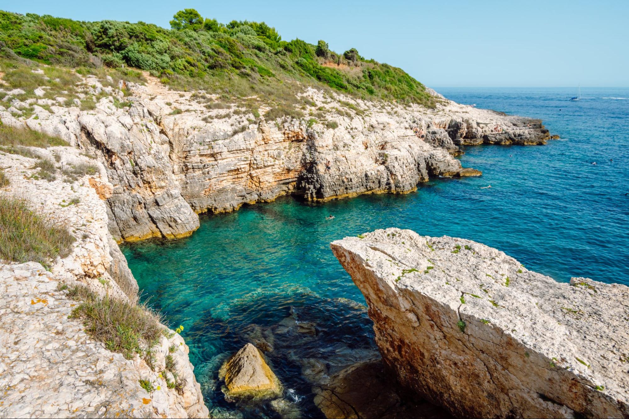Cape Kamenjak rocky coastline with turquoise sea in Istria
