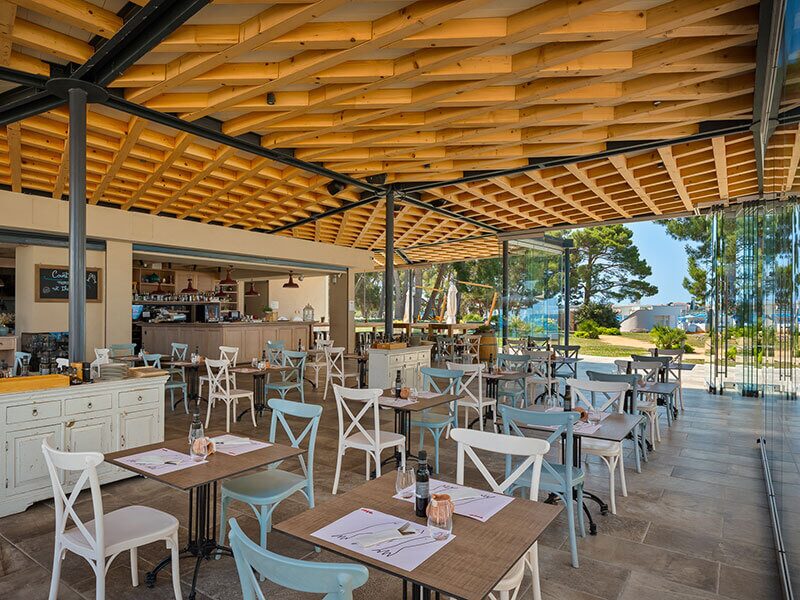 Terrace of Fogo by Bekal restaurant with an open kitchen overlooking the sea in Poreč, Istria